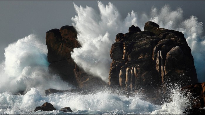 Waves crashing against rocky shore