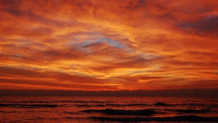 Fiery Sunset Over the Ocean