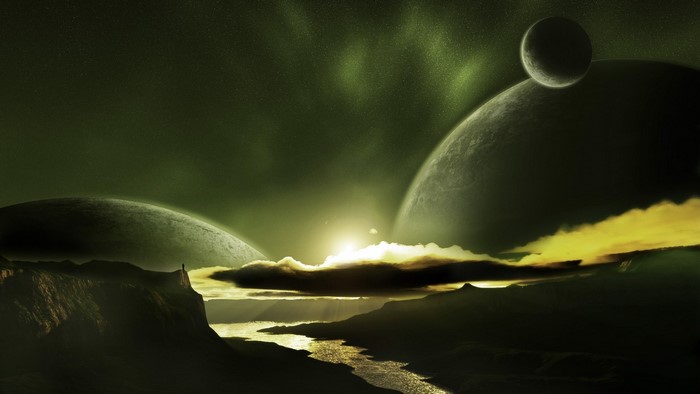 Alien landscape with planets and a lone figure