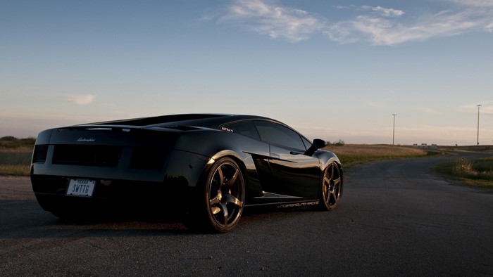 Black Lamborghini Gallardo on a Road