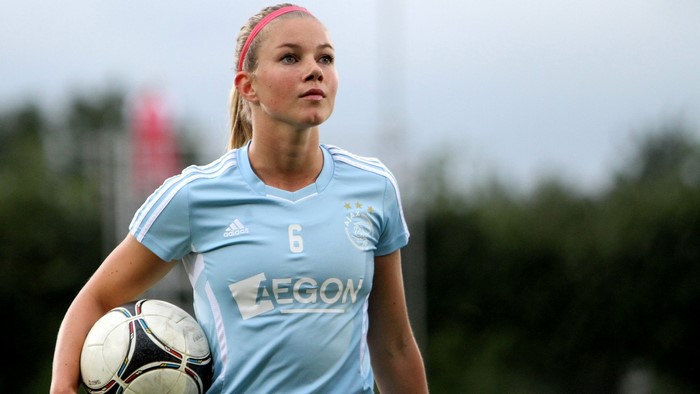 Anouk Anna Hoogendijk of Ajax holding a soccer ball