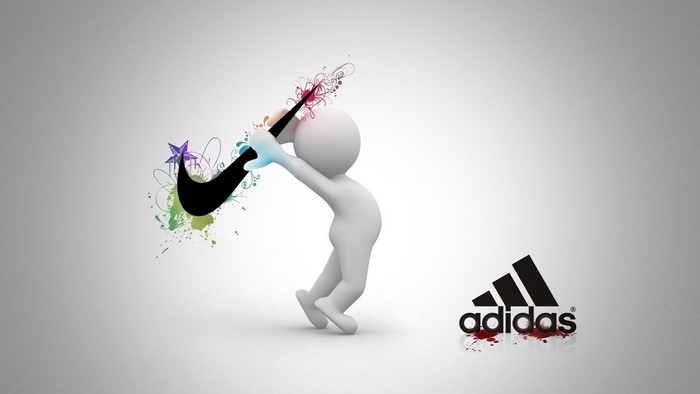 3D figure with Nike logo vs Adidas logo