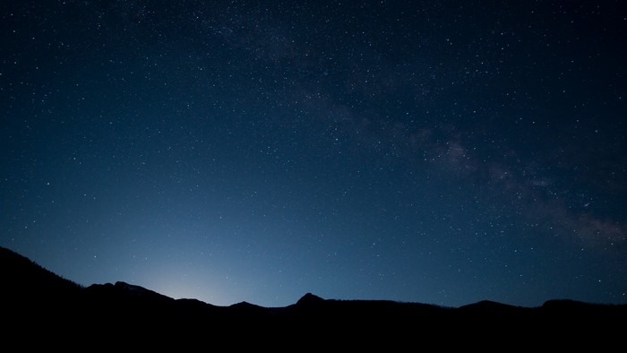 Night Sky with Stars and Mountains