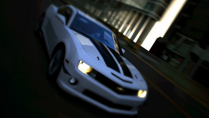 White Chevrolet Camaro with black stripes