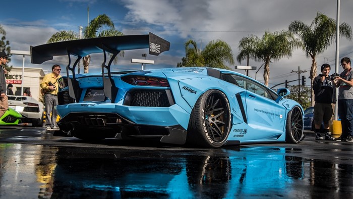 Light blue Lamborghini Aventador with large rear wing