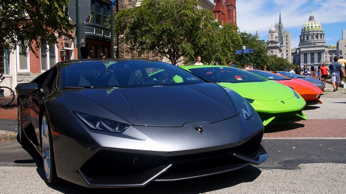 4K Lamborghini cars parked on a street