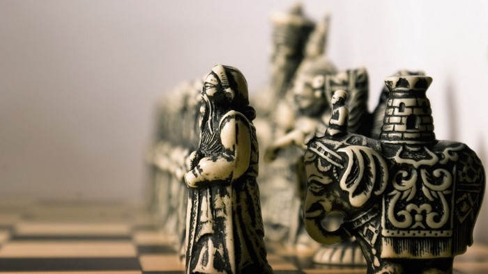 Chess pieces on a board
