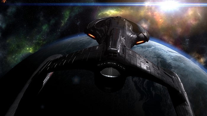 4K Klingon Bird-of-Prey spaceship over planet