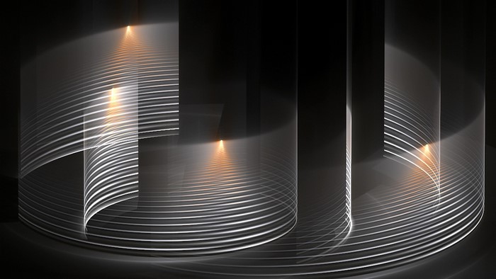 Abstract light streaks forming cylindrical shapes
