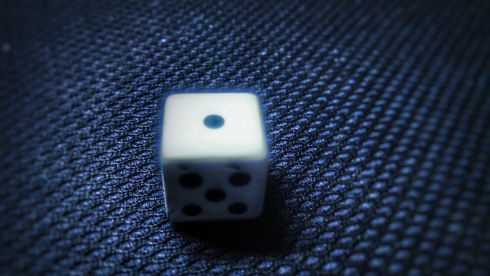 White die with one and five dots