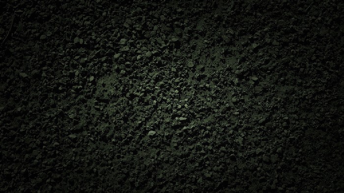 Dark Textured Ground with Small Rocks