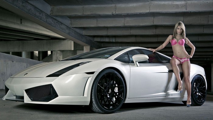Woman in bikini posing with white Lamborghini