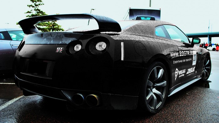 Black Nissan GT-R with racing decals