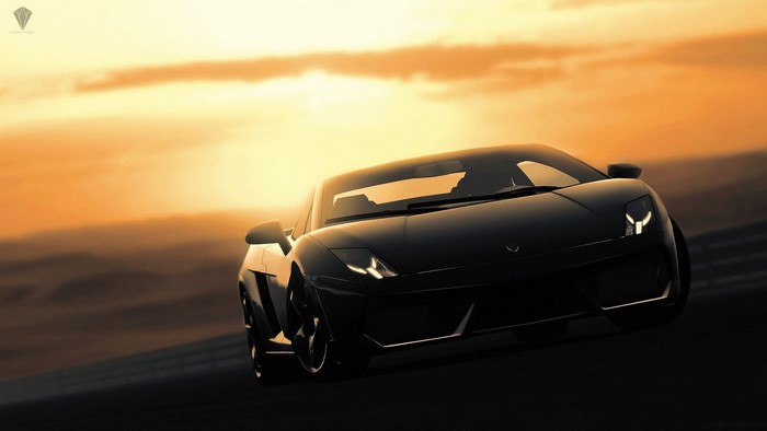 Black Lamborghini driving at sunset