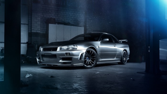 Nissan Skyline GT-R R34 in a garage