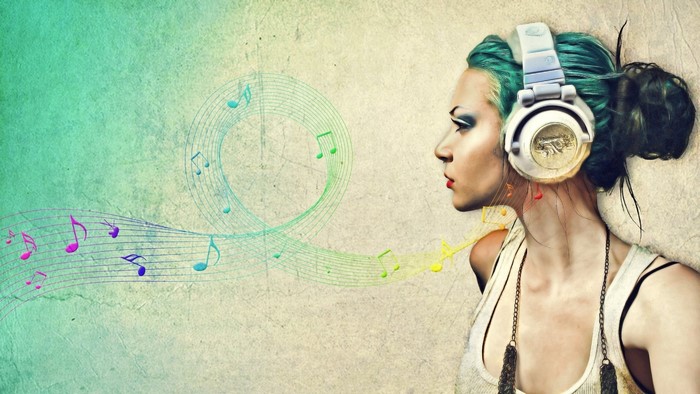 Woman with headphones and musical notes