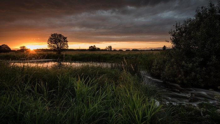 4K Sunset Over a Rural Landscape