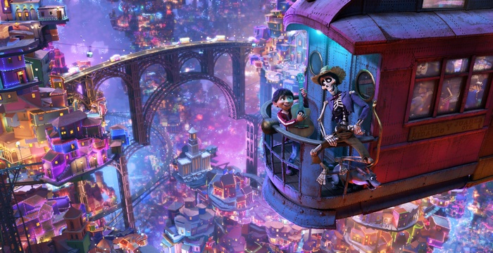 Hector and Miguel from Coco in a train car overlooking a colorful city