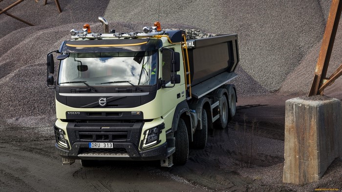 Volvo FMX dump truck loaded with gravel