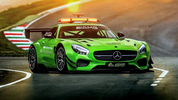 Green Mercedes-AMG safety car on a race track