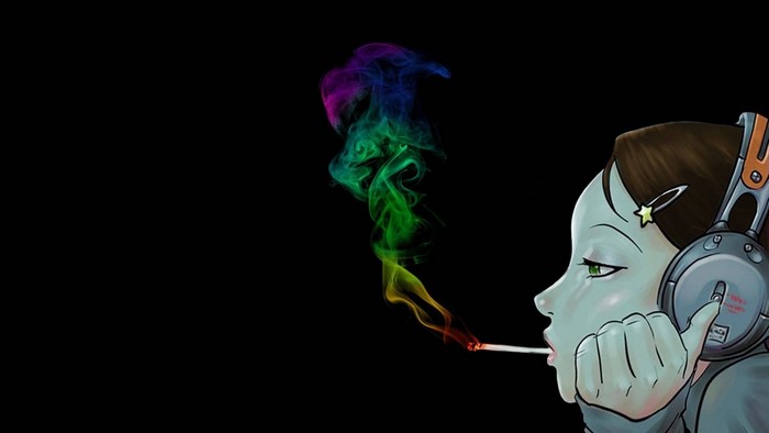 Girl with headphones smoking rainbow smoke