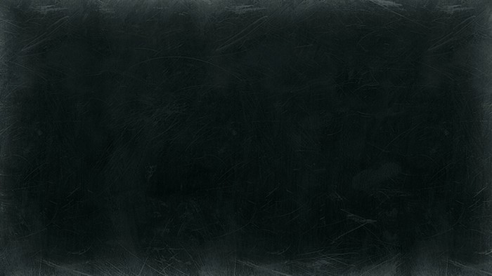 Dark textured surface with scratches