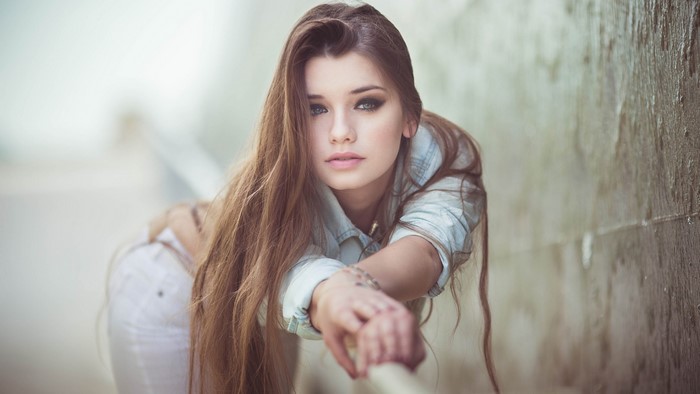 Beautiful young woman with long brown hair
