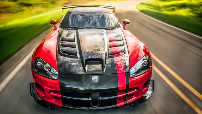Red and black Dodge Viper ACR on a road