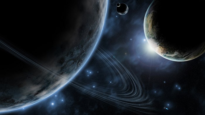Planets with rings and moons in space