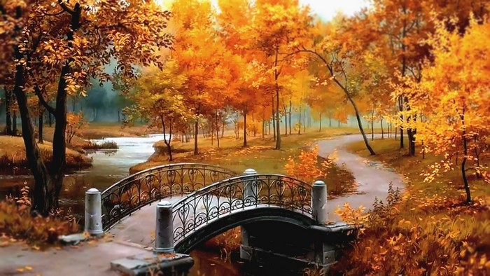 Autumn park with bridge over river and path