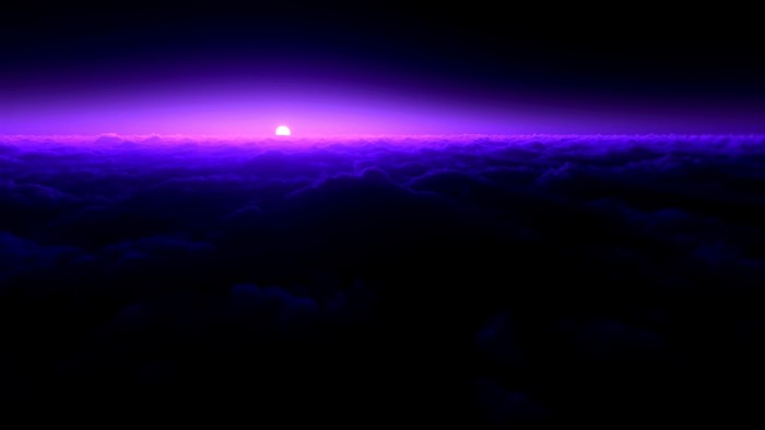Purple sunset over clouds
