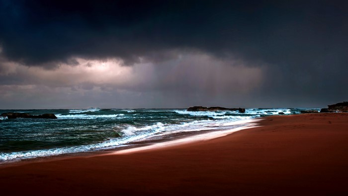 4K Ocean Waves Crashing on Beach Under Stormy Sky