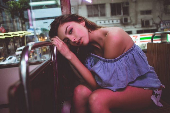 Celine Farach on a bus in the city