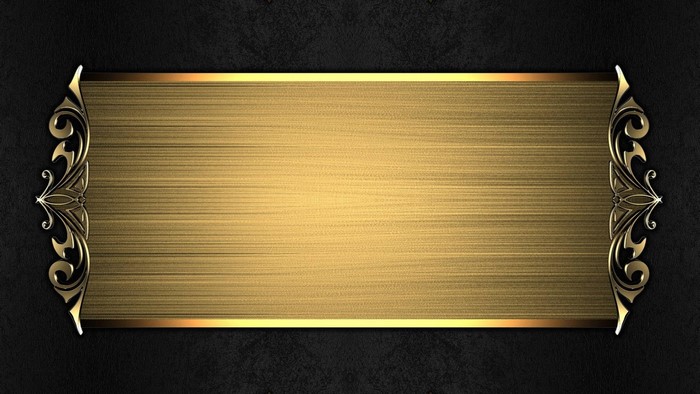 Gold plate with ornate gold trim on black textured background