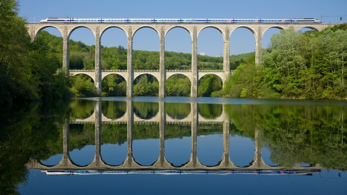 Train on a Roman Arch Bridge in France