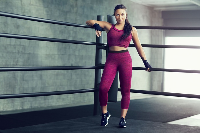 Demi Lovato in Fabletics workout gear in a boxing ring