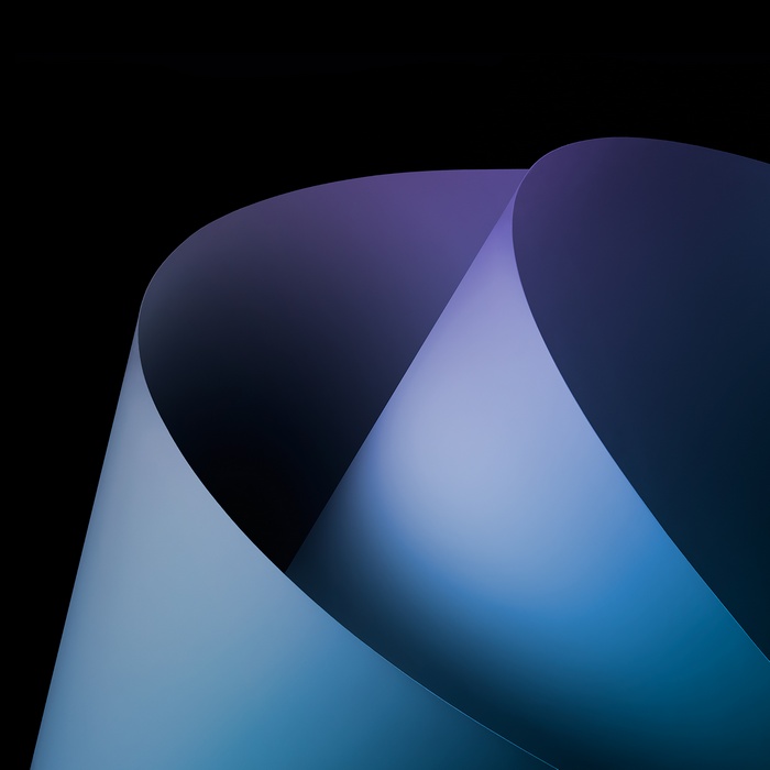Abstract paper folds with blue and purple gradient
