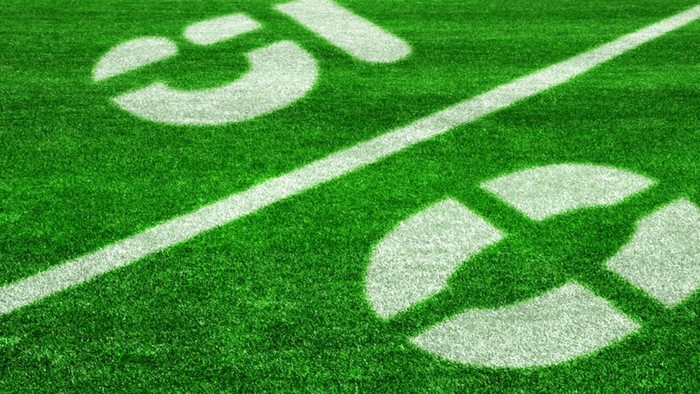 NFL 50 Yard Line on Grass Field