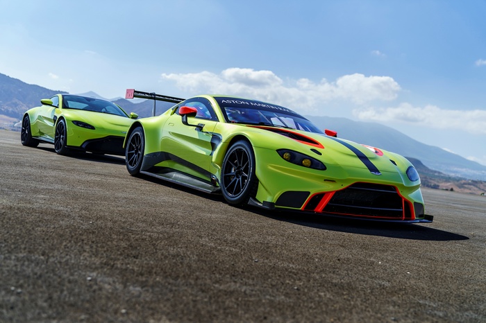 Aston Martin Vantage GTE race cars on a track