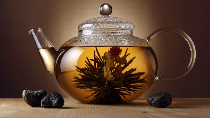 Blooming tea in a glass teapot