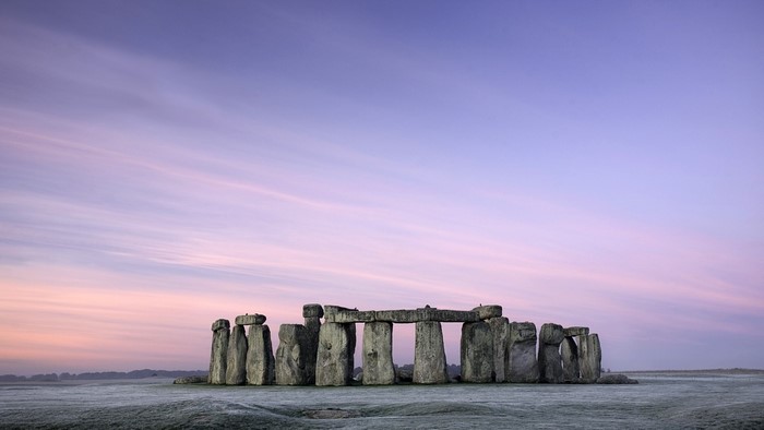 Stonehenge at sunrise with long exposure sky