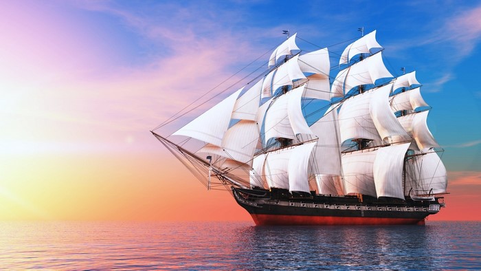 Sailing Ship on the Ocean at Sunset