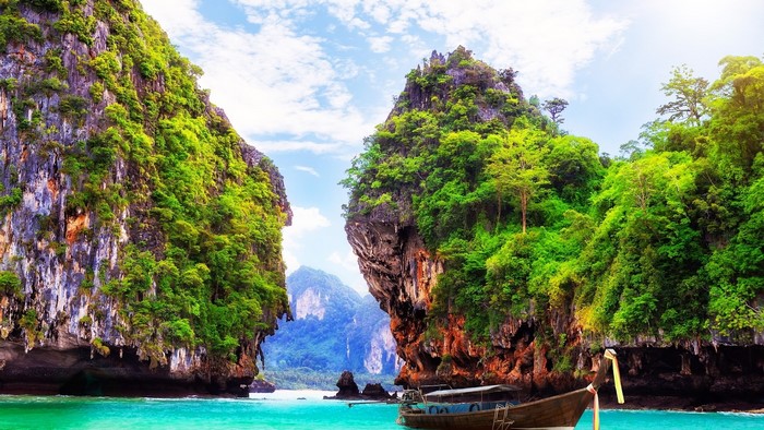 Thailand Beach with Limestone Cliffs and Boat