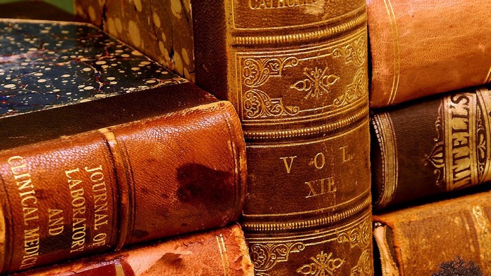Stack of antique leather-bound books