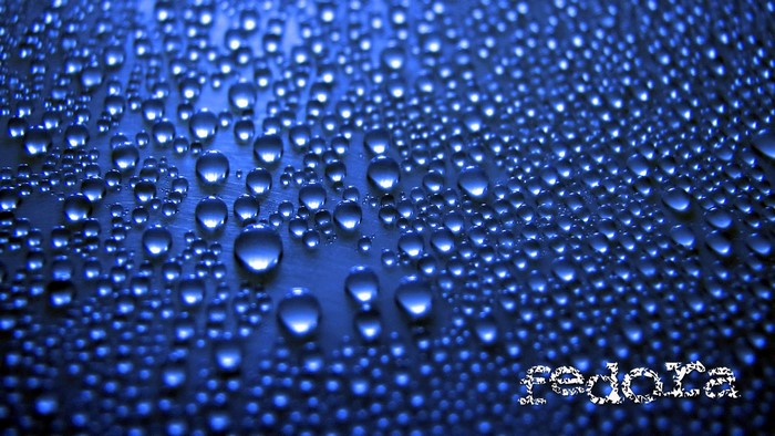 Fedora logo on water droplets