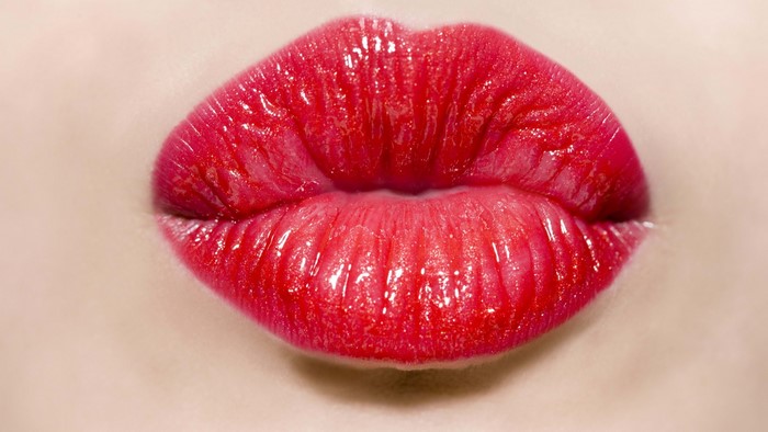 Close-up of Red Glossy Lips