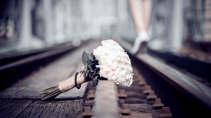 White Rose Bouquet on Train Rails