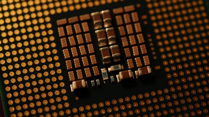Close-up of a computer processor's pins and components
