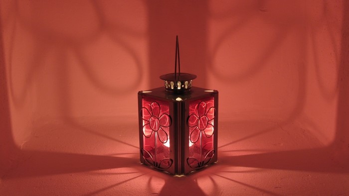 Red stained glass lantern with floral design