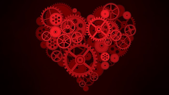 Red Gears Forming a Heart Shape